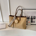 Large casual women's shoulder tote bag in polyester with exterior pocket and internal organiser