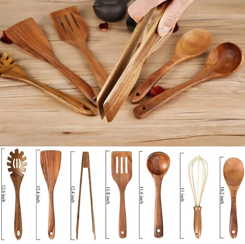 7-piece beechwood cooking utensil set including wooden spoon, spatula, ladle, and pasta fork on kitchen counter