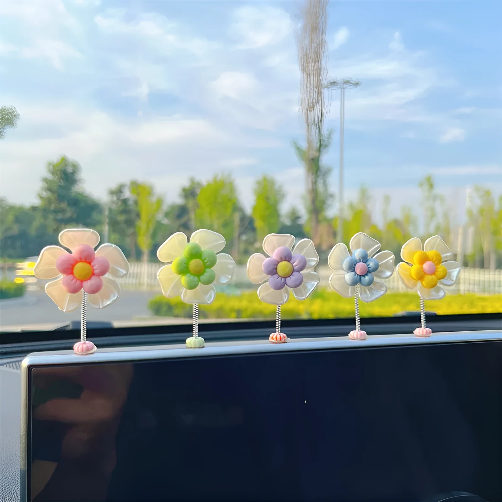 Plastic car swing decoration in choice of five colours measuring 5cm high
