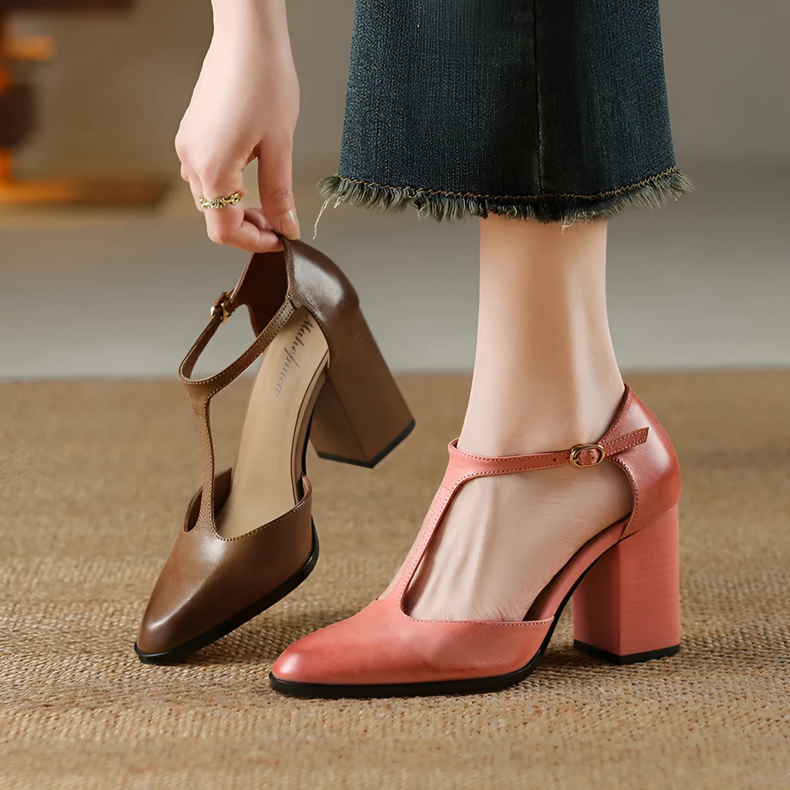 Women's dark brown retro pointed-toe Mary Jane shoes with a buckle fastening on a leather upper.