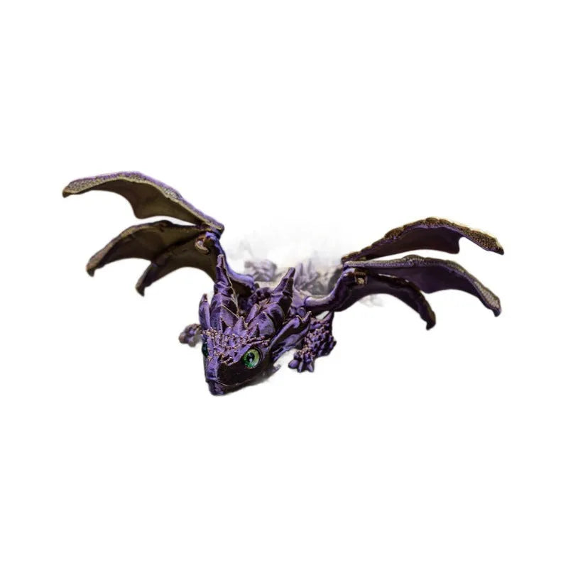 Red and gold 3D printed dragon wings toy decoration on a white background.