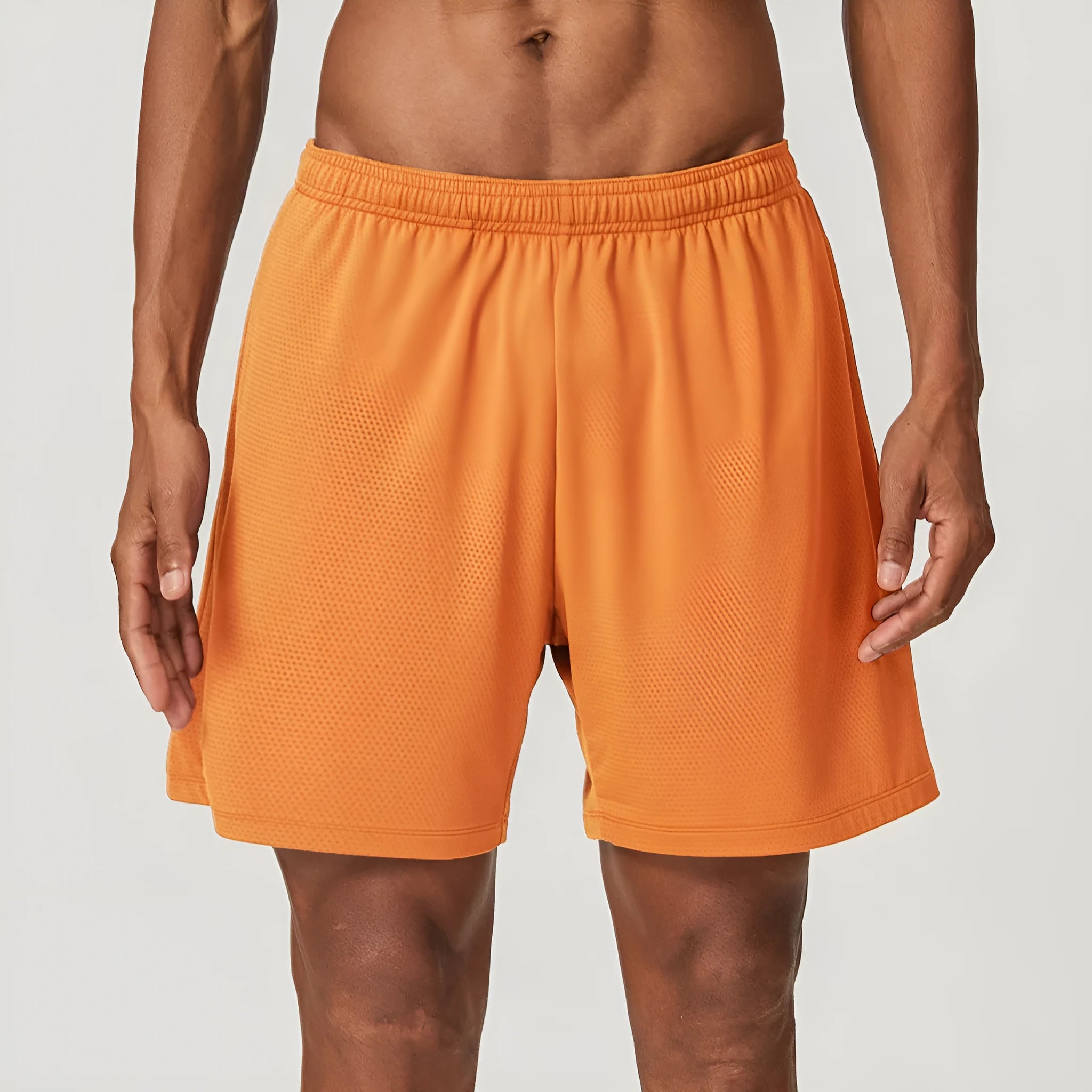 Men's double-layer running shorts in sky green, showing mid-waist fit and shorts length.
