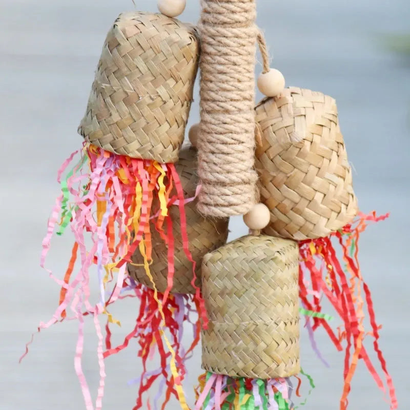 Natural wood and sisal rope parrot foraging toy with colourful shredded paper measuring 15cm by 35cm