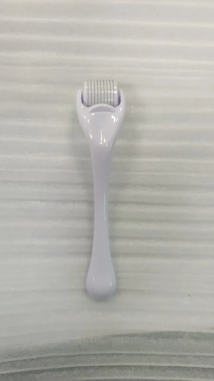 540 micro needle derma roller showing handle and wheel in different colour combinations with size specifications