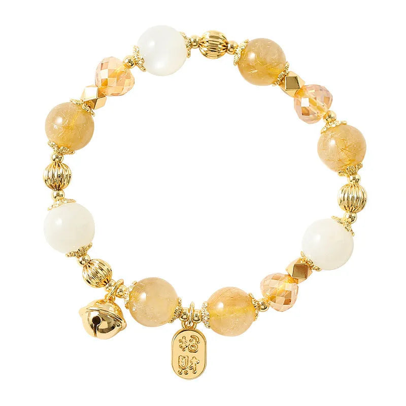 Gold electroplated rutilated quartz bracelet showing Korean style design and lucky fortune gold colour
