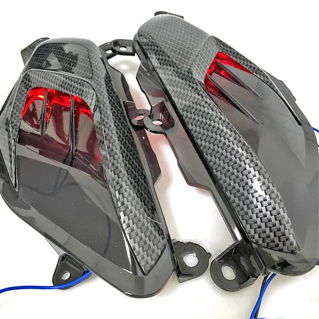 Pair of carbon fibre style LED side lamps for Yamaha NMAX125 and NMAX155 scooters.
