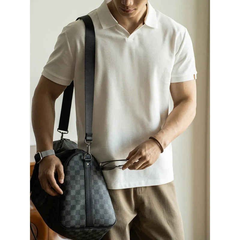 American-style short-sleeve polo shirt in blue, black, or white cotton-polyester blend.