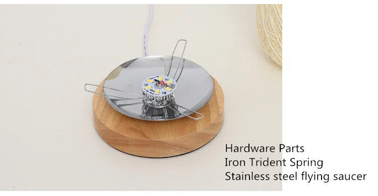 Sepak Takraw ball desk lamp made of brown hemp rope on a wooden base with USB cable