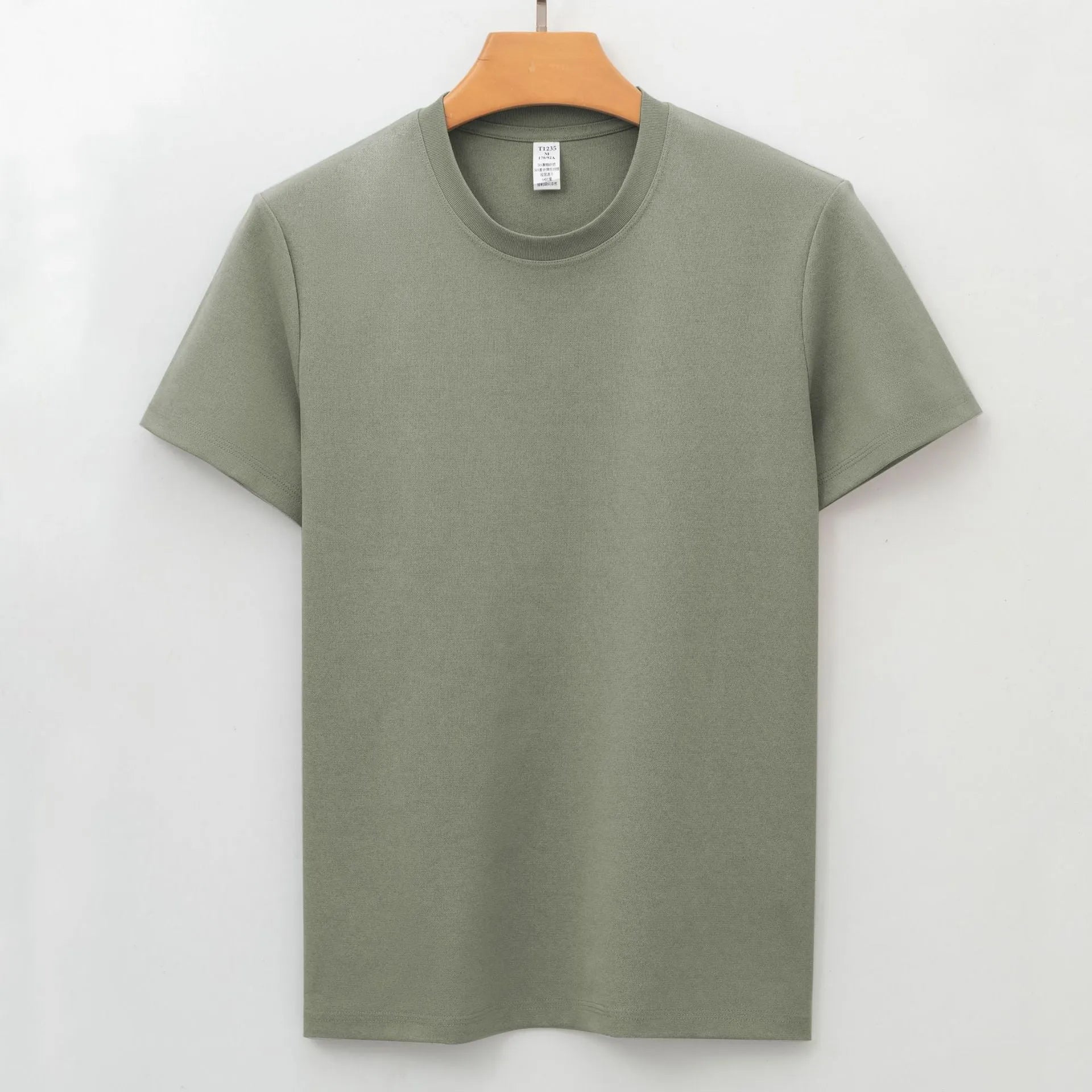Men's solid colour quick-dry antibacterial short sleeve t-shirt on a hanger.