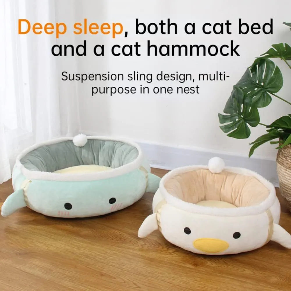 Green dinosaur and chick-shaped cat bed shown both flat as a sofa and hanging as a hammock for small pets.