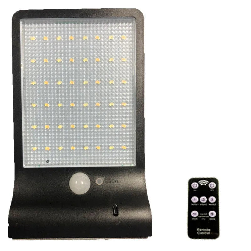 Black and white outdoor solar-powered garden lamp with IP65 waterproof rating for courtyard and balcony lighting.