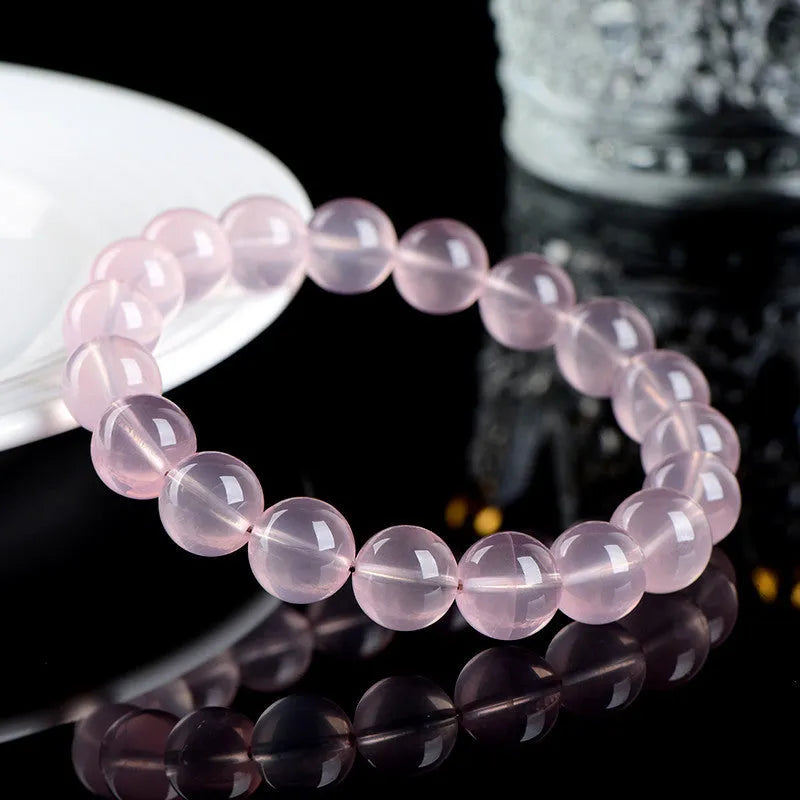 Natural starlight crystal round beads bracelet in pink with polished finish