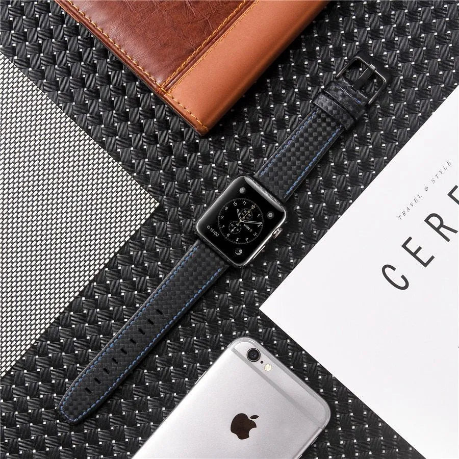 Carbon fibre leather Apple Watch strap showing red, black, orange, and blue line colour options
