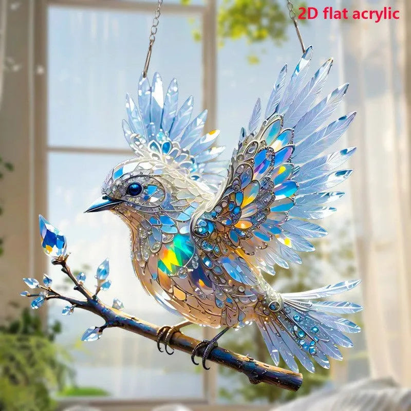 Square clear acrylic bird pendant ornament with colourful cartoon design, shown with cardboard backing.