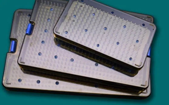 Three silicone disinfection boxes showing large, medium and small sizes with transparent lids