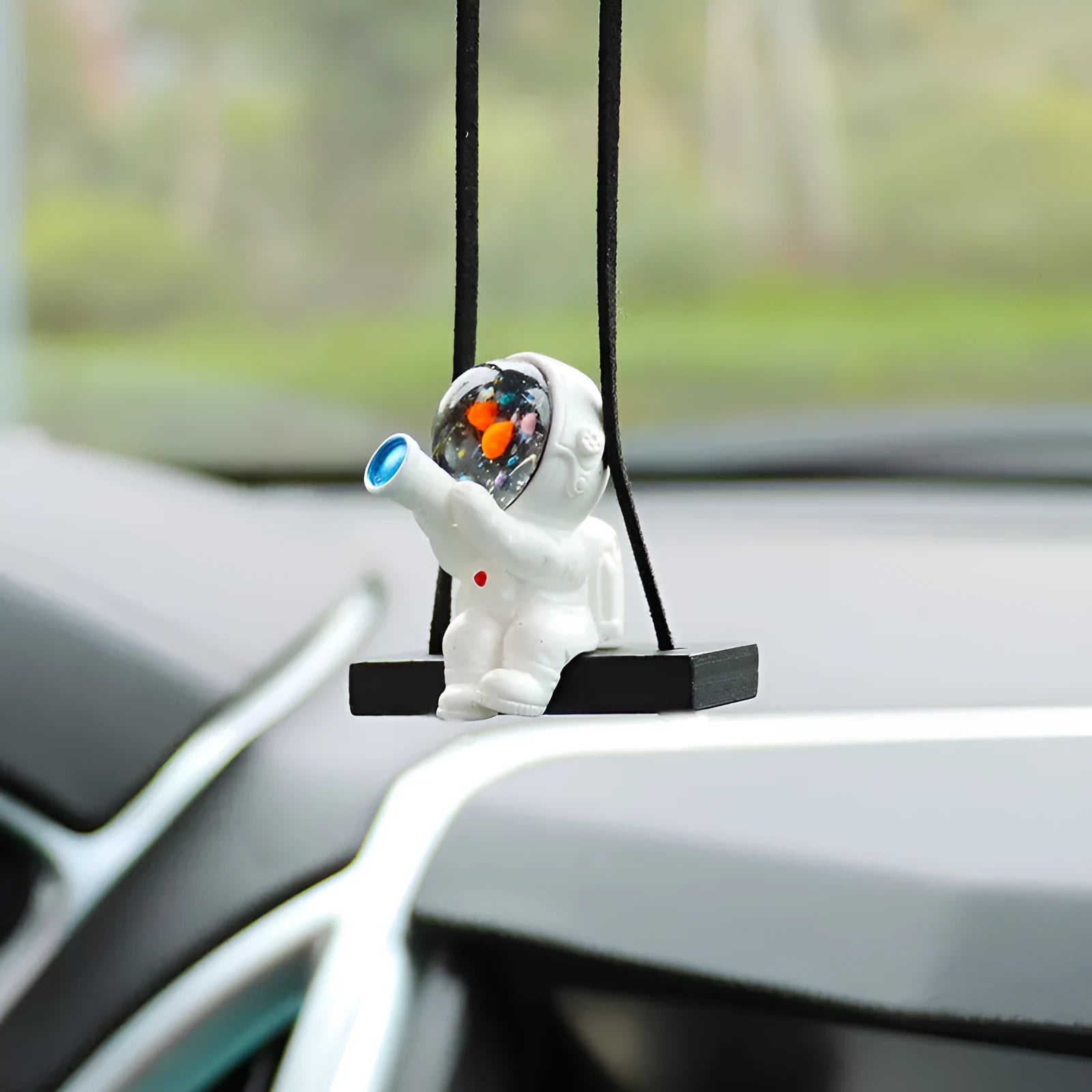 Resin car pendant with cartoon astronaut designs for vehicle interior decoration