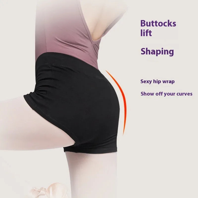 Black cotton ballet dance shorts for women, laid flat showing solid colour and stretch fit.