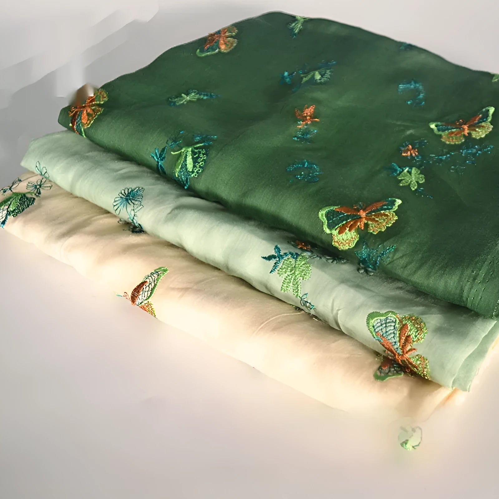 Pure ramie fabric in beige, grass green, and dark green, showing 140cm width.