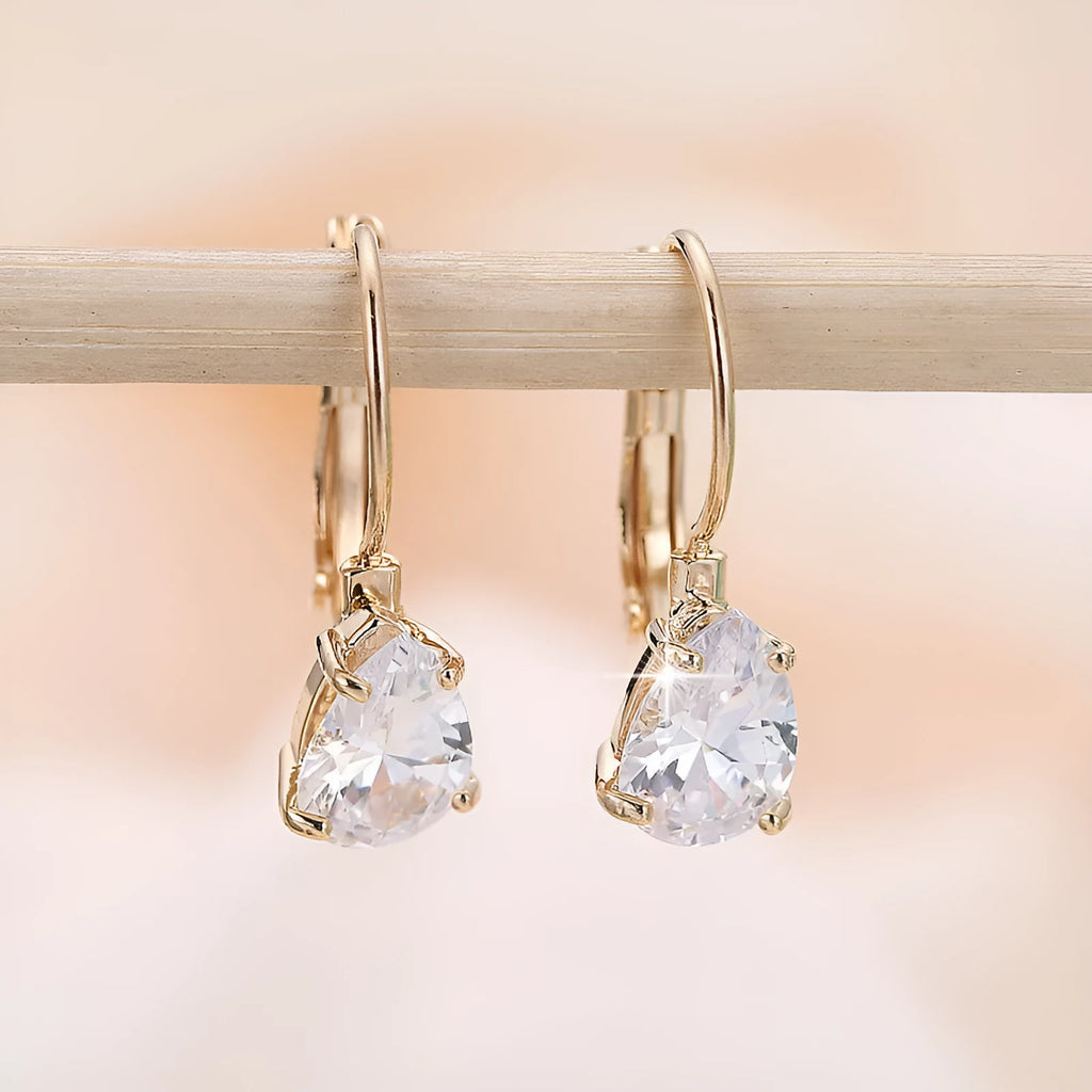 Women's drop-shaped copper earrings in gold or platinum colour finishes