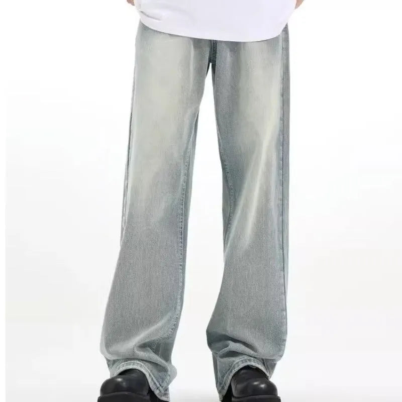 Blue loose-fit retro-style casual trousers with an elastic waistband on a hanger.