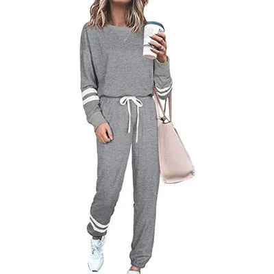 Women's plus size casual suit set with loose-fitting top and trousers in solid colour