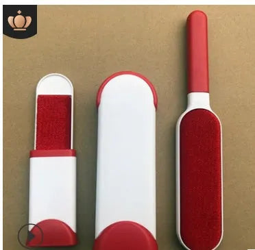 Blue reusable pet hair removal comb with a double-sided sticky brush and self-cleaning base.