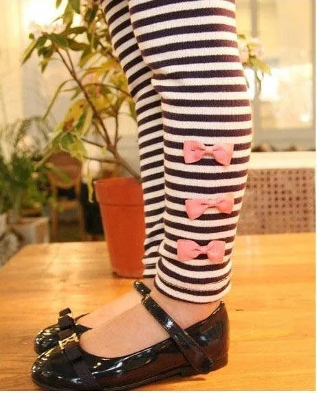 A pink cotton girls clothing co-ordinated set available in sizes 110cm, 120cm, 130cm, and 140cm.