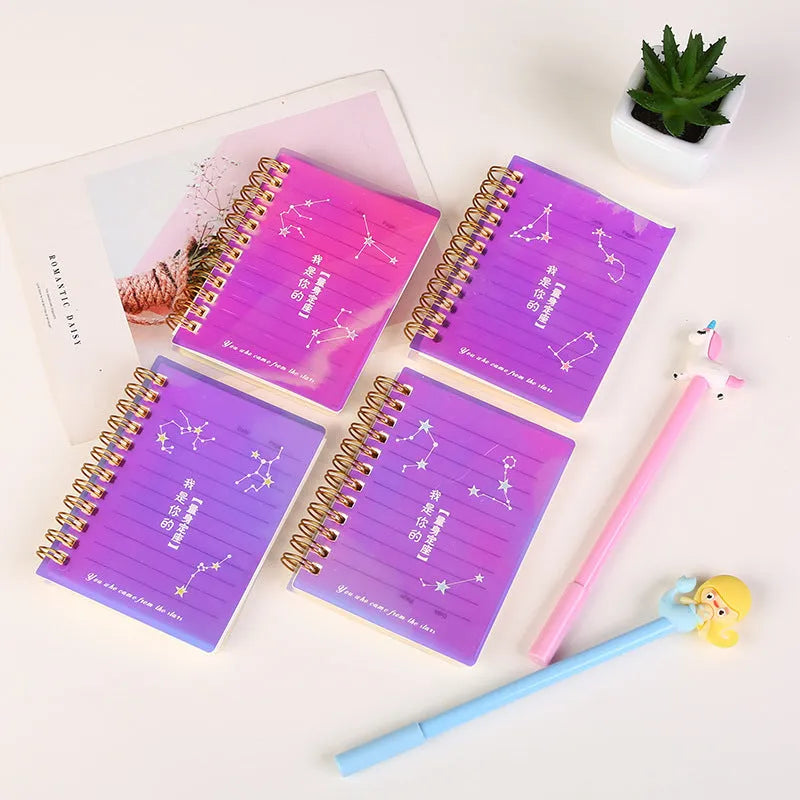 Pack of four rollover coil A7 pocket notebooks showing constellation, sakura, ocean, and universe cover designs