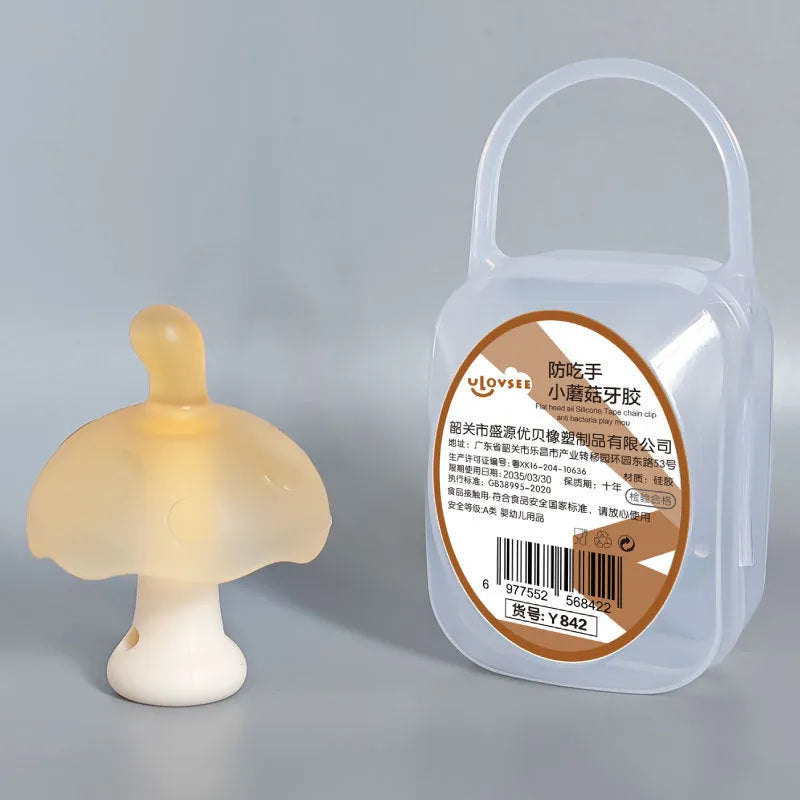 Small mushroom-shaped silicone chew gum with transparent chain attachment in pink colour