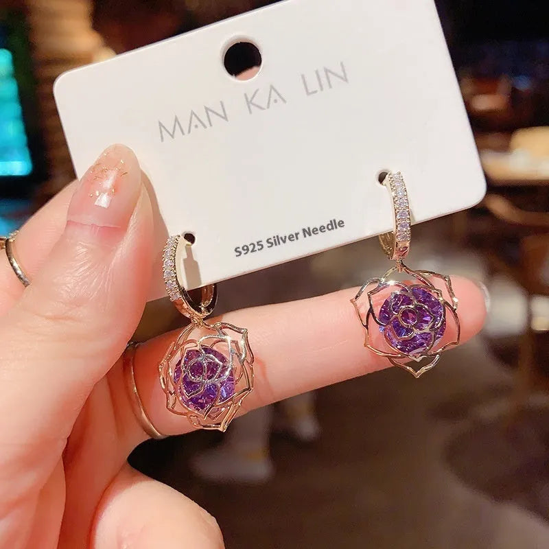 Geometric copper earrings with zircon stones in electroplated finish