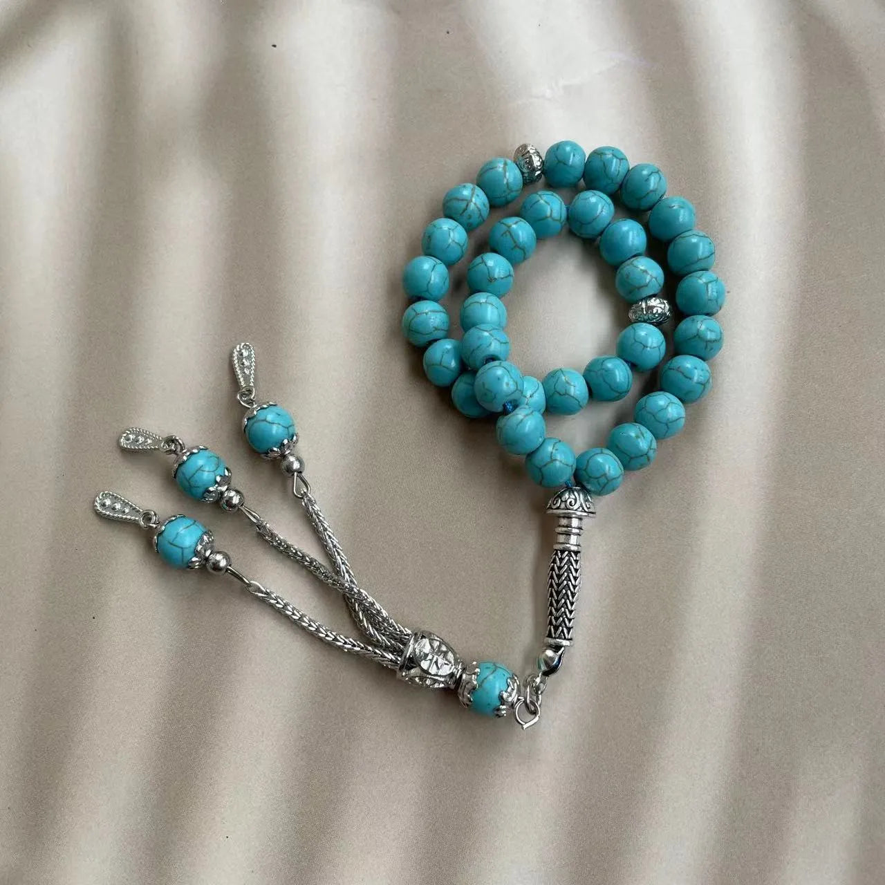Handmade sky blue stone Muslim worship bracelet with 8mm beads on wrist
