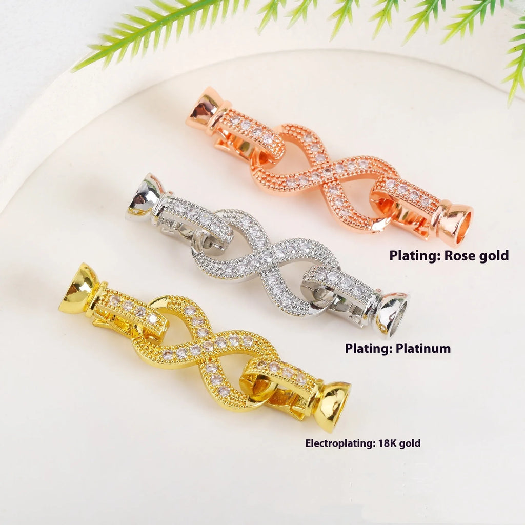 Small gold-coloured metal jewellery clasp for DIY necklace and bracelet making.
