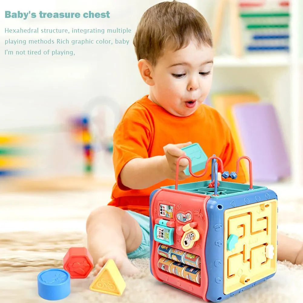 Colourful hexahedron educational cube with bead mazes, gears, numbers, and vehicle graphics