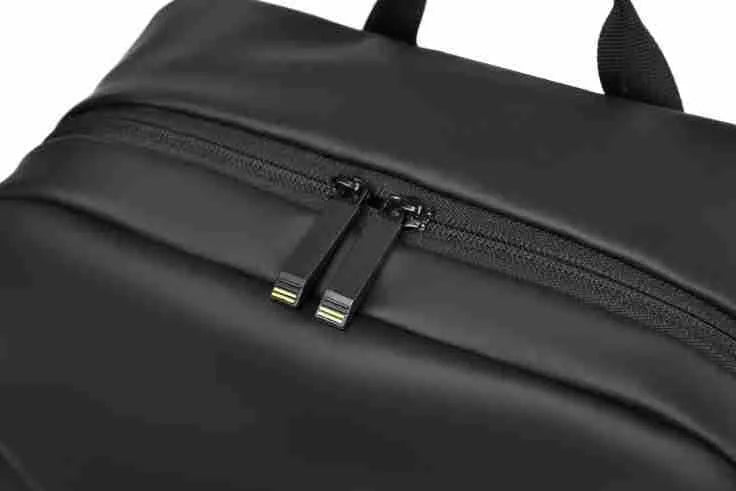 Men's large waterproof PU backpack in black, blue, or grey showing sewing thread details
