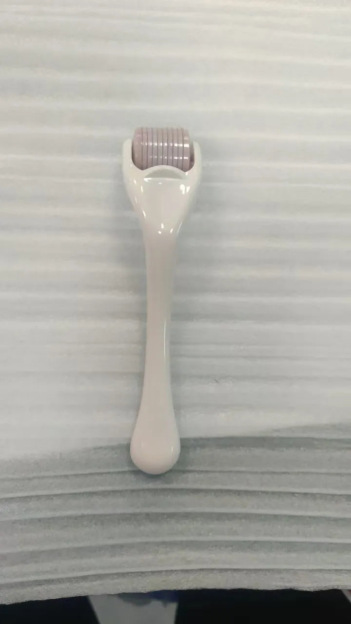 540 micro needle derma roller showing handle and wheel in different colour combinations with size specifications