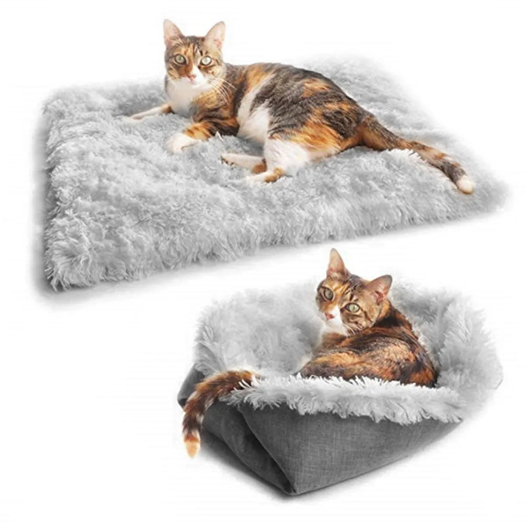 Grey and white long plush pet bed with black non-slip bottom particles
