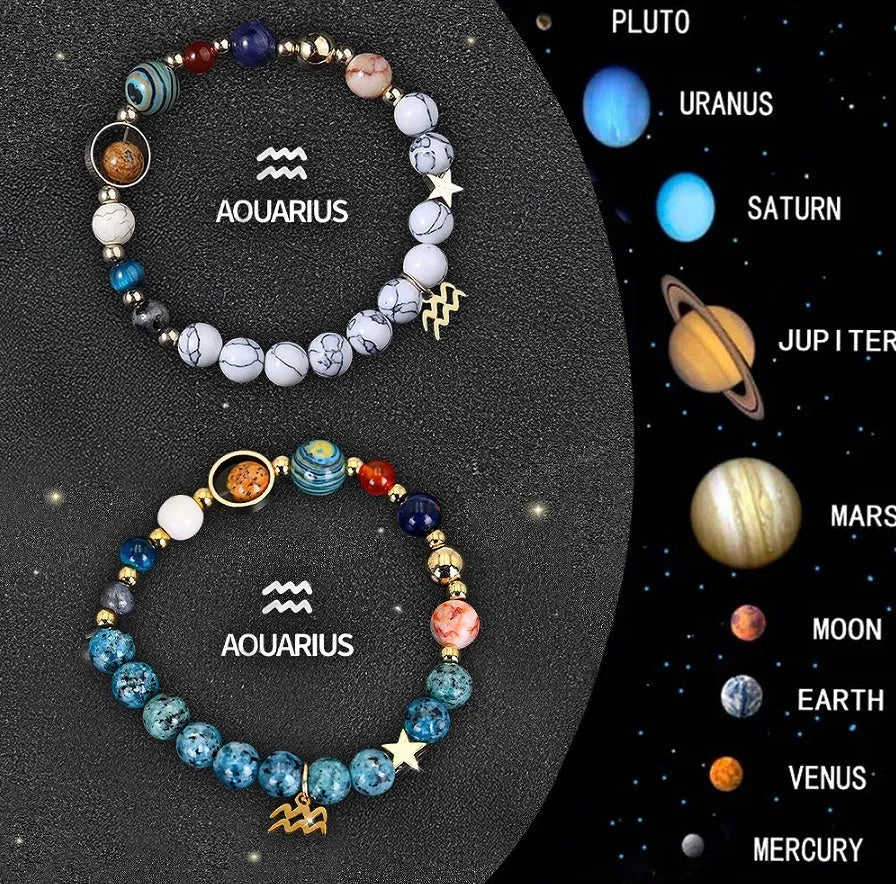 Set of two natural stone beaded bracelets featuring zodiac sign designs on a dark background