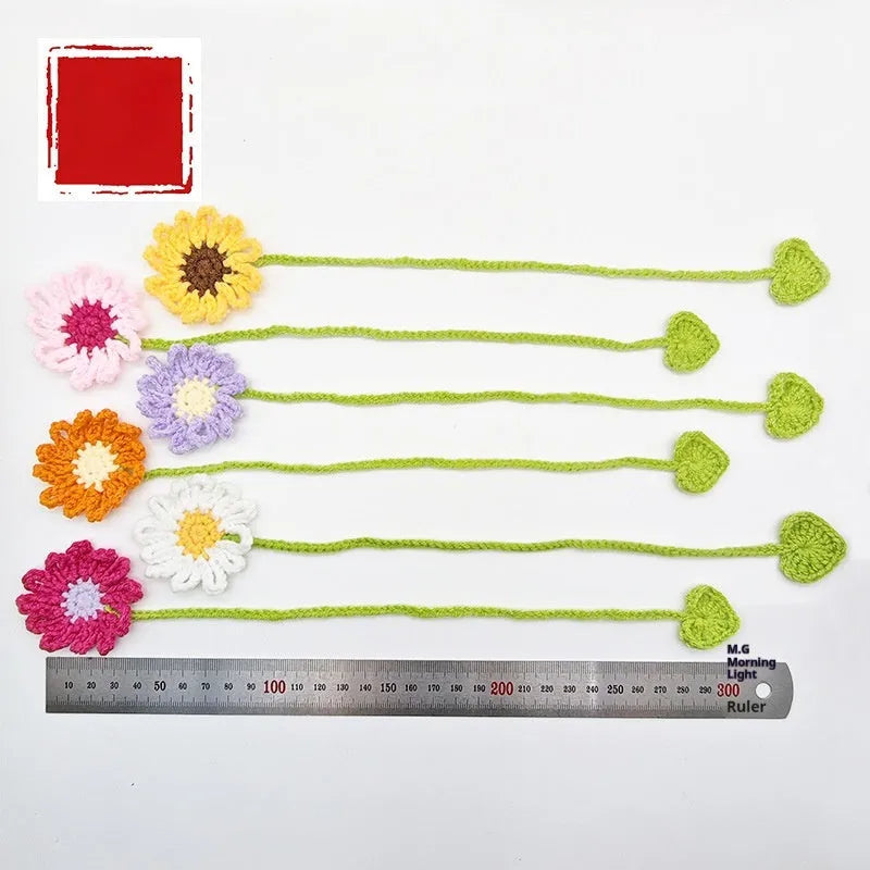 Hand-crocheted wool daisy bookmark with flexible wire core in multiple colour options