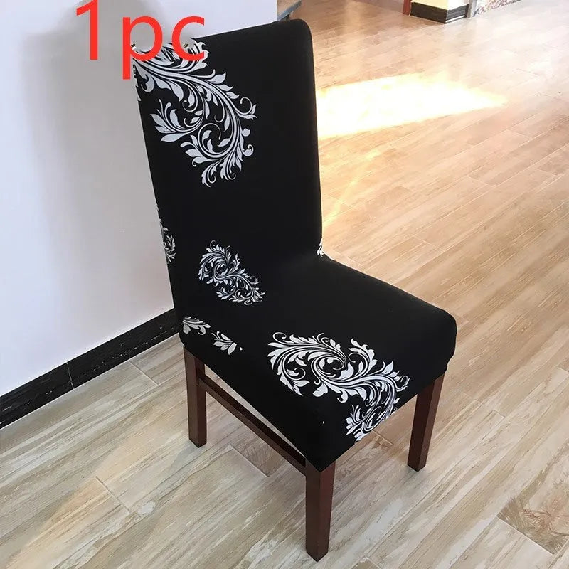 A stretchy spandex chair cover fitted neatly on a four-legged wooden dining chair.