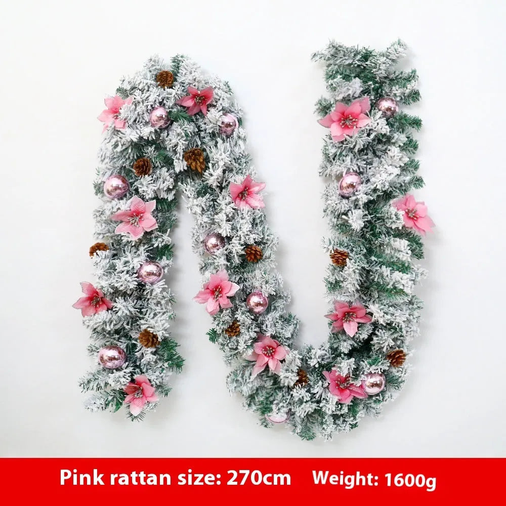 PVC rattan Christmas garland with flocked decoration in golden colour, draped along a mantle