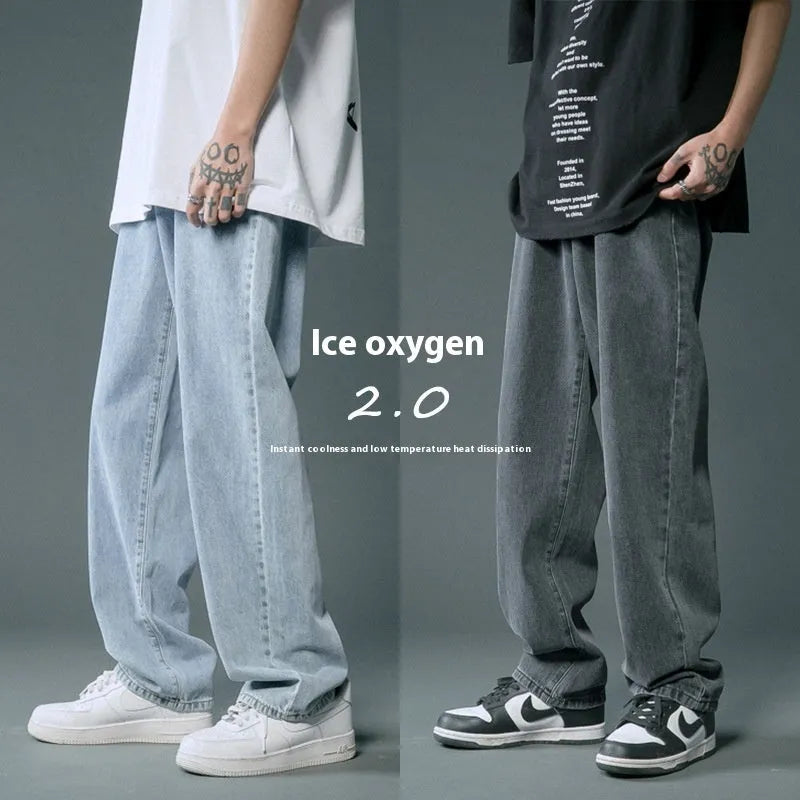 Loose straight cotton denim jeans for men in light blue colour with mid waist and button fly