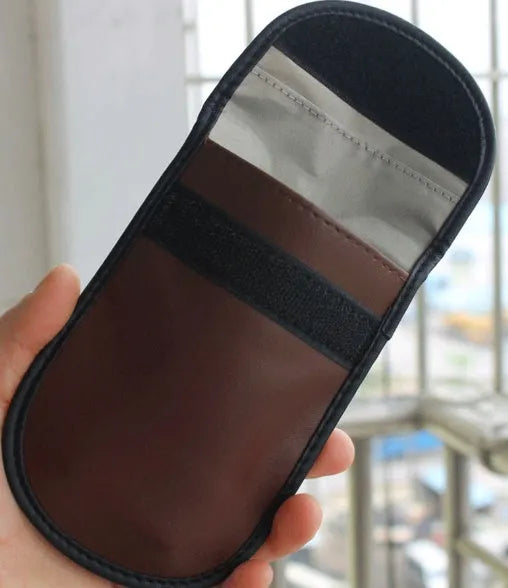 Black microfiber RFID blocking bag for car keys and cards measuring 13.5 by 9.5 cm