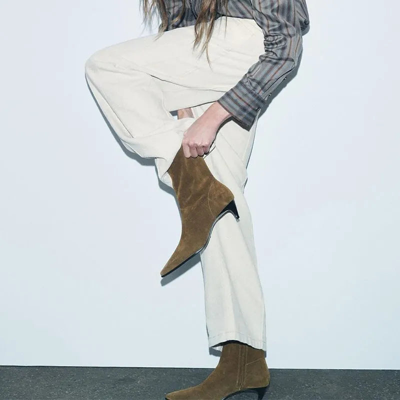 Brown women's square toe ankle boots with a side zipper and a mid kitten heel on a white background.