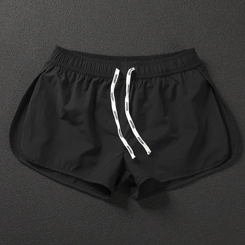 Men's loose beach surfing shorts in quick-dry polyester available in orange, green, and black