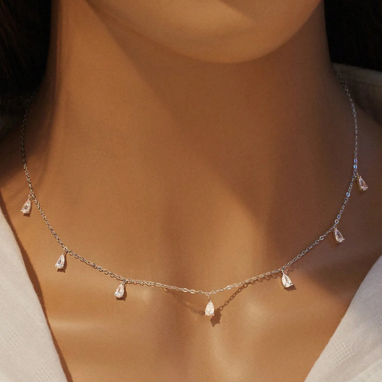 Women's adjustable 925 silver necklace with a drop-shaped pendant on an O-chain in silver, rose gold, or golden yellow finish.