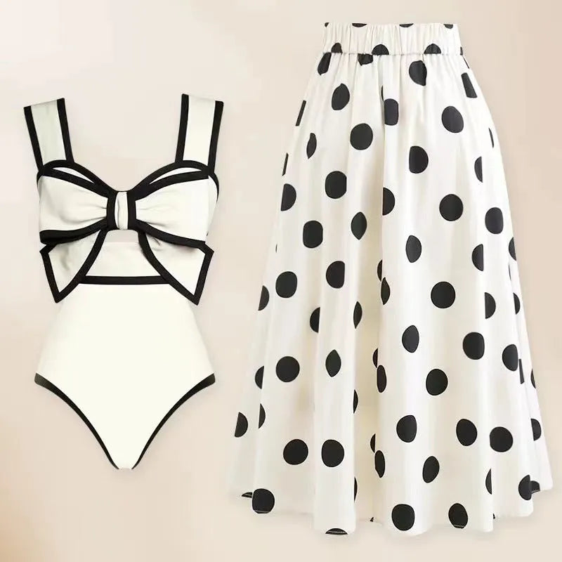 Women's one-piece swimsuit with beach dress style featuring bow detail and round skirt in polyester fabric