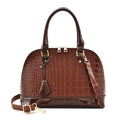 Shiny PU crossbody shoulder bag in shell shape showing black, brown, and red colour options