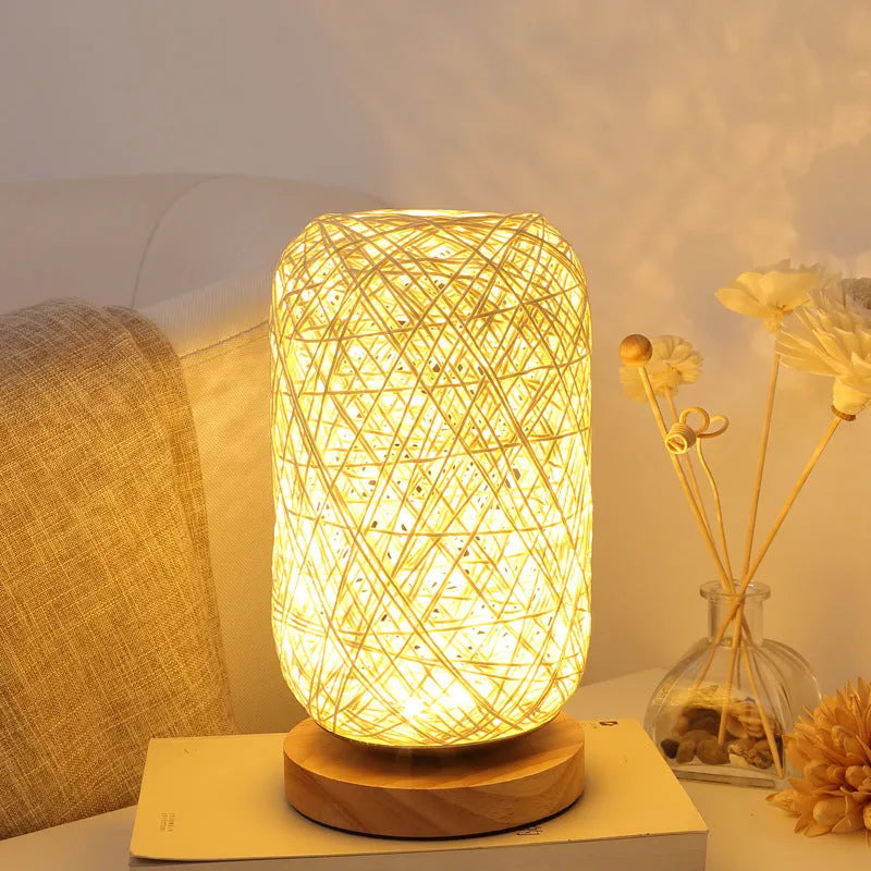 Sepak Takraw ball desk lamp made of brown hemp rope on a wooden base with USB cable