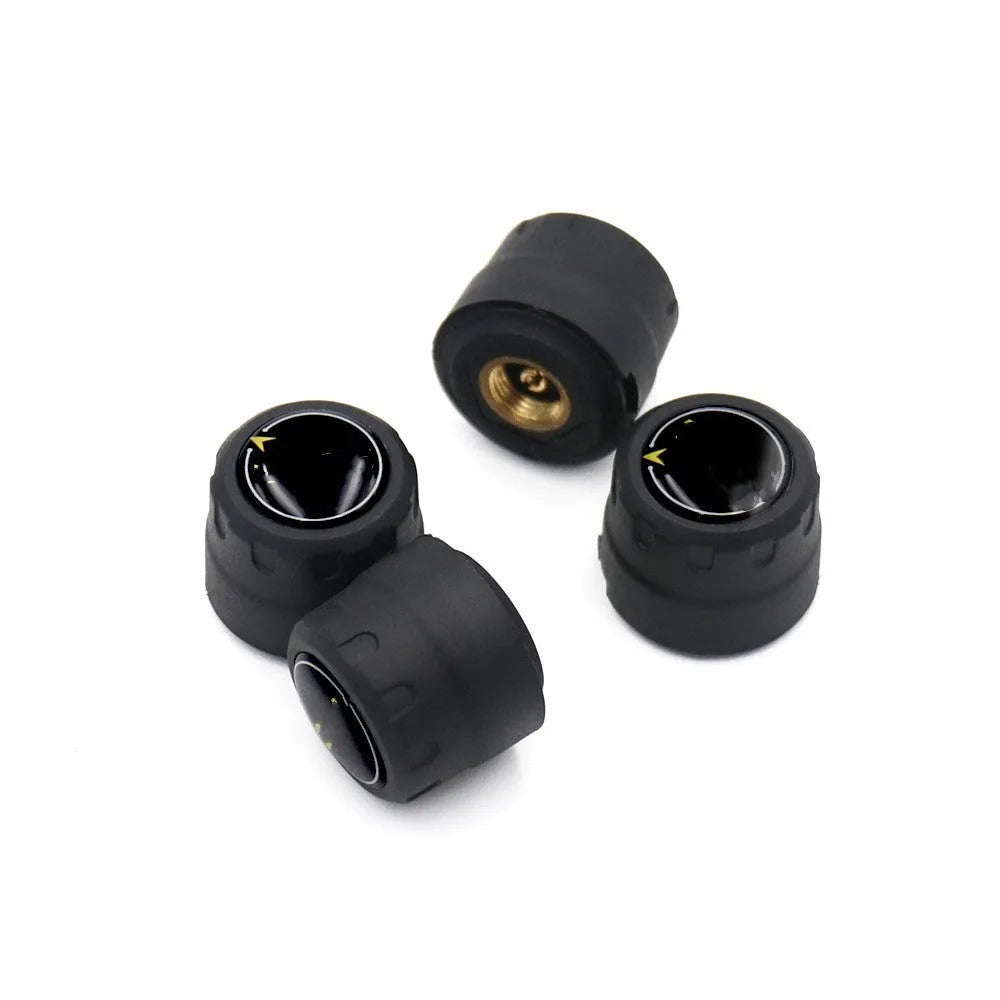 Black automotive tyre pressure monitoring system with four Bluetooth sensors and installation tools