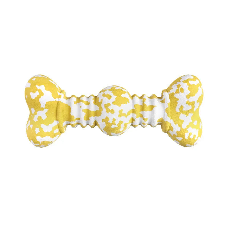 Green and white camouflage pattern natural rubber dog chew toy for large dogs on a wooden floor.